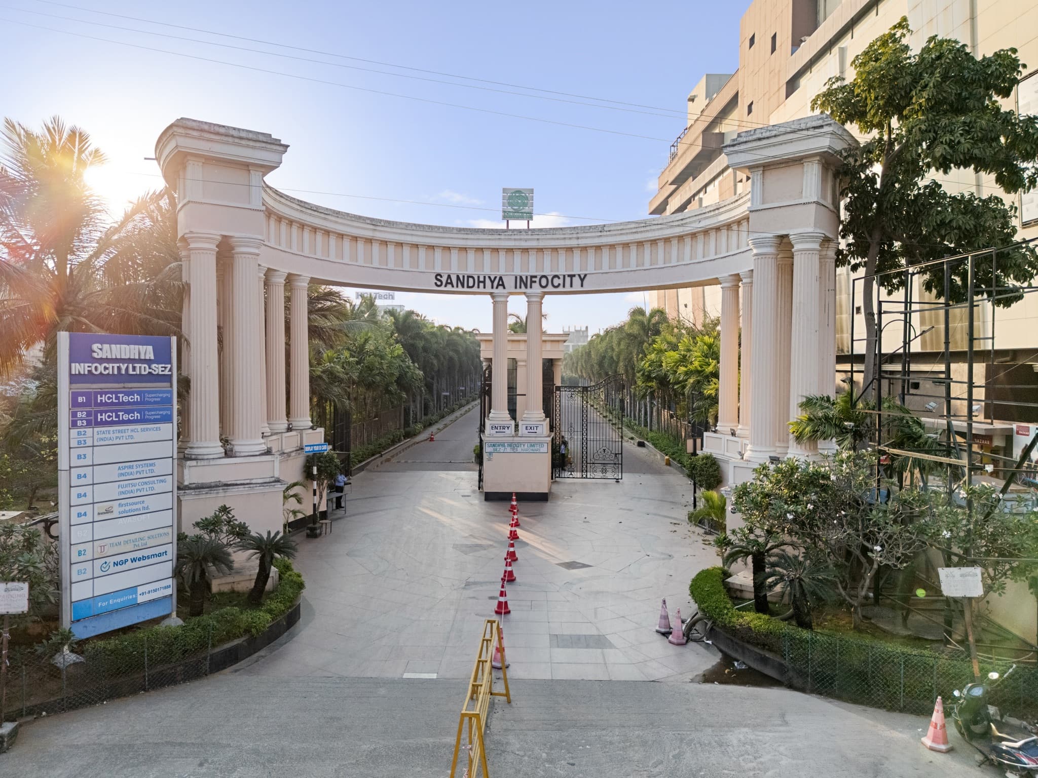 The colonnaded arrival gate of the Sandhya Infocity IT SEZ at first light