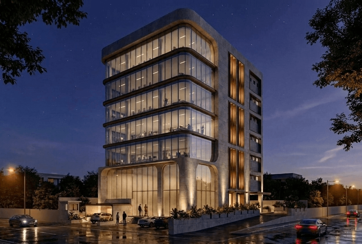 Night render of Renvia Vantage, a glass and stone Grade A tower lit at dusk on the HITEC City main road beside Raidurgam Metro